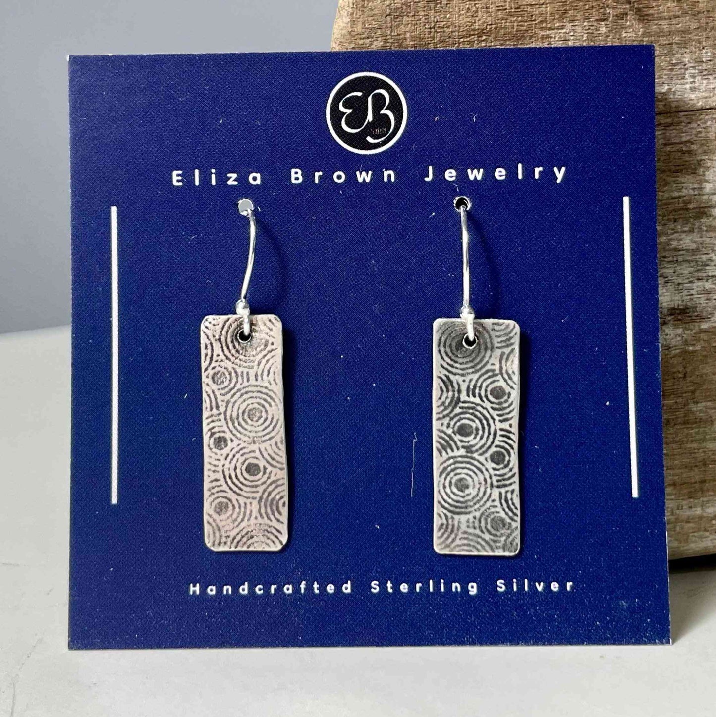 Circle Pattern Silver Earrings - Elegant Jewelry featuring rectangular sterling silver dangles with intricate circular etching, handcrafted design.