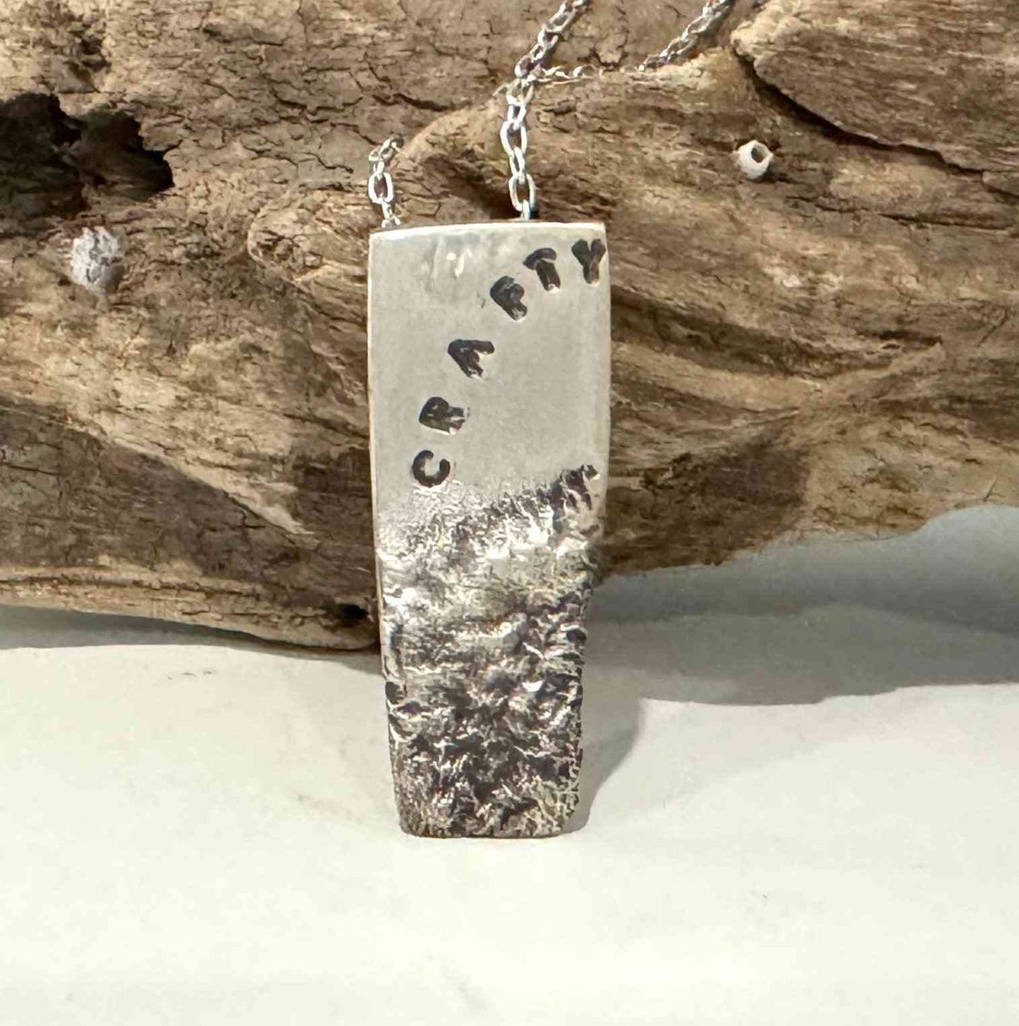 CRAFTY Stamped Silver Pendant - eliza brown jewelry