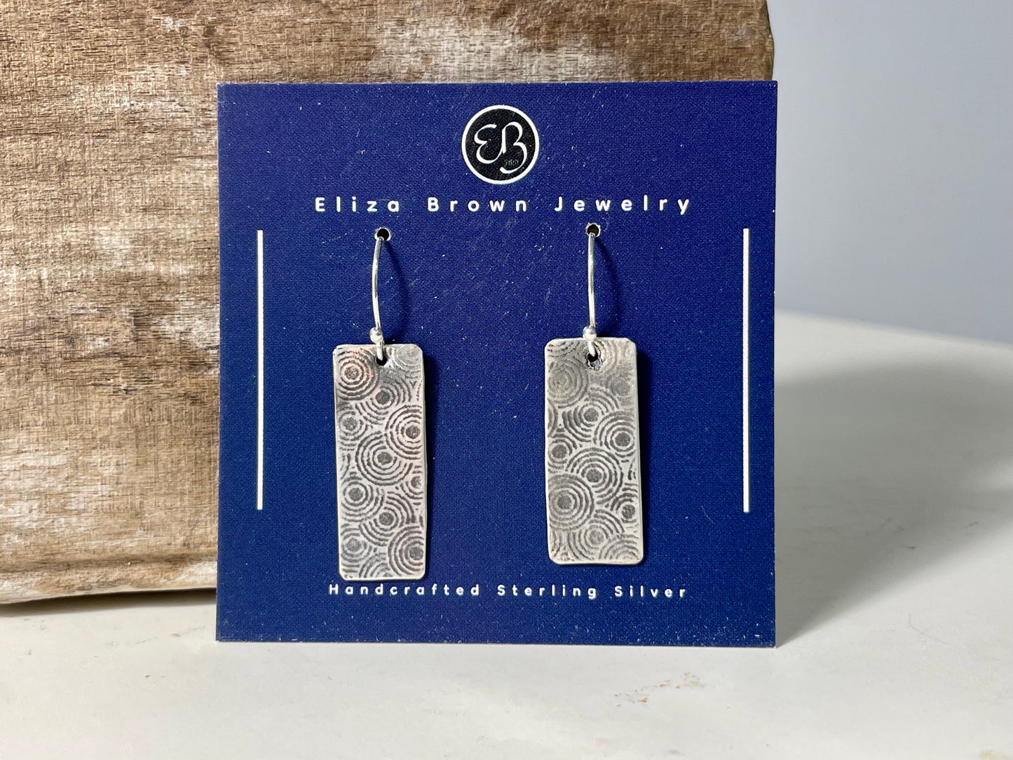 Circle patterned silver earrings