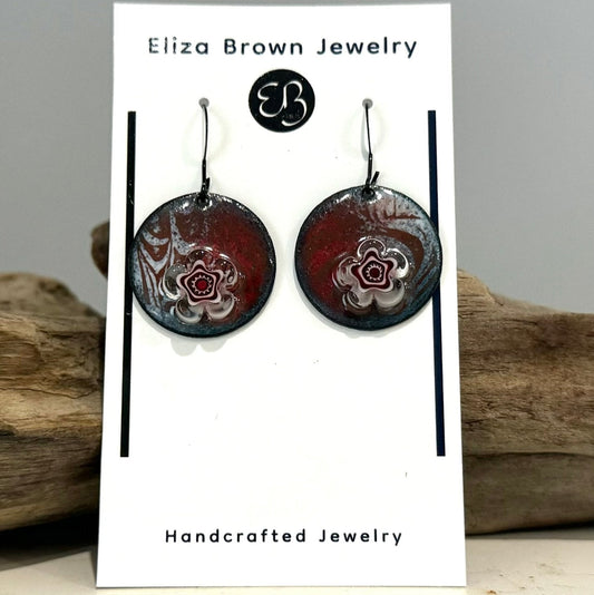 Floral  patterned enameled circle earrings. Handcrafted